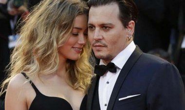 محامو جوني ديب يواجهون أمبر هيرد بحبها له