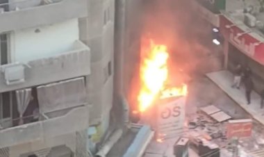 تواصل عمليات التبريد للمحلات المحترقة فى حريق عزبة النخل بالمطرية