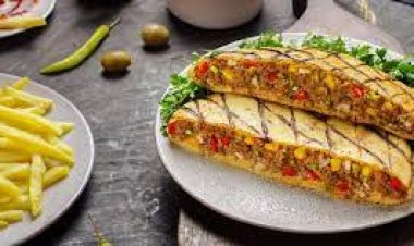 تعرفي على طريقة عمل حواوشى الفراخ في المنزل