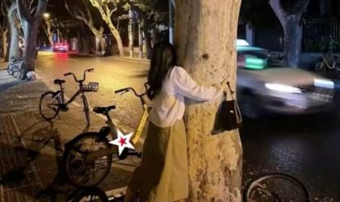 فتاة تحتضن الأشجار في الشارع  لهذا السبب !!