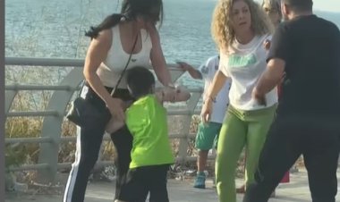 ماغي بوغصن تتشاجر مع أم تضرب ابنها (فيديو)