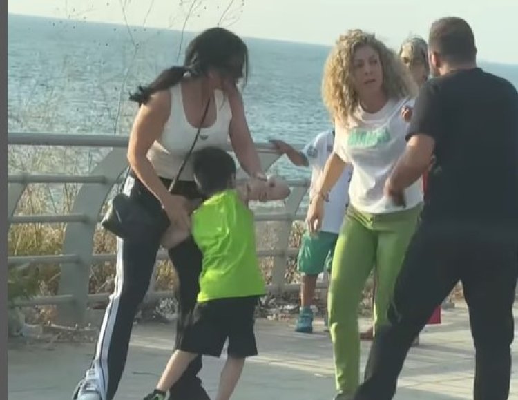 ماغي بوغصن تتشاجر مع أم تضرب ابنها (فيديو)