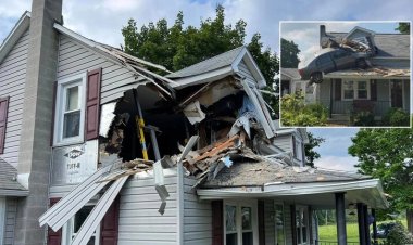 أشبه بأفلام الأكشن.. سيارة تطير في الهواء وتعلق بالطابق الثاني بمنزل أمريكي