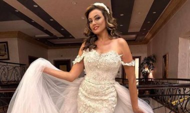 بشرى تخطف الأنظار بفستان زفاف أبيض  (اعرف الحكاية)