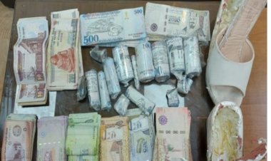 ضبط سيدة أثناء محاولتها تهريب مبالغ مالية بمطار القاهرة