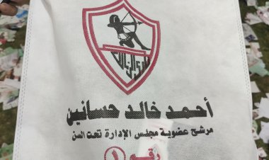 بالمخالفة لقواعد الانتخابات.. توزيع زجاجات مياه المرشحين أمام اللجان