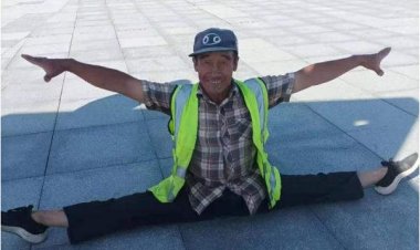 عامل نظافة  يرقص الباليه في شوارع الصين