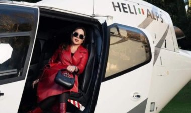 أسما إبراهيم تقود طائرة هليكوبتر في أحدث جلسة تصوير في إيطاليا