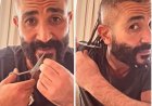 في فيديو على حسابه الشخصي..  أحمد سعد يقص ضفائر شعره ويزيل أقراط ذقنه