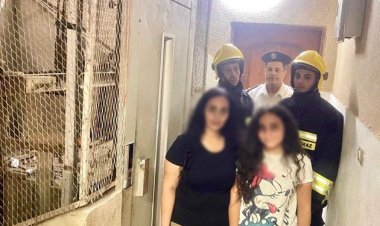 الأمن  ينقذ سيدة وابنتها من داخل مصعد محاصر بالفيوم 