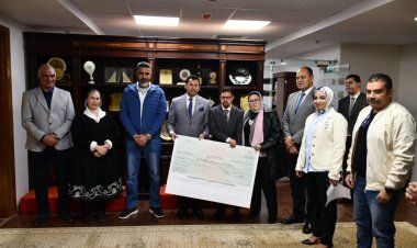 وزير الشباب والرياضة يكرم أول غطاس مصري من متلازمة داون