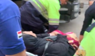 أمن القاهرة ينقل سيدة غير قادرة على الحركة للمستشفى 