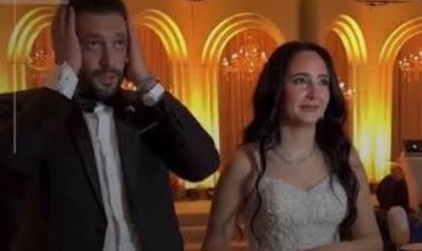 عروسان يوقفان زفافهما لمتابعة ركلات ترجيح مصر وأستراليا
