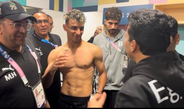 «بياكلوا بيتزا».. وزير الرياضة يفاجئ لاعبي المنتخب الأوليمبي في غرفة الملابس | صور