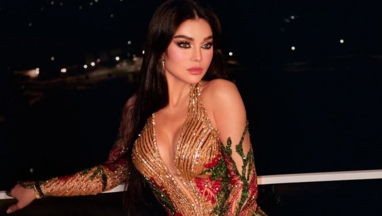 مزيج الفخامة والأنوثة.. هيفاء وهبي تخطف القلوب بفستان ذهبي مرصع بالورود الحمراء