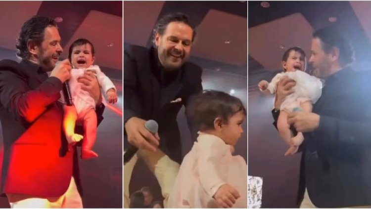راغب علامة يداعب طفلا رضيعا ويرقص به في حفله بالأردن