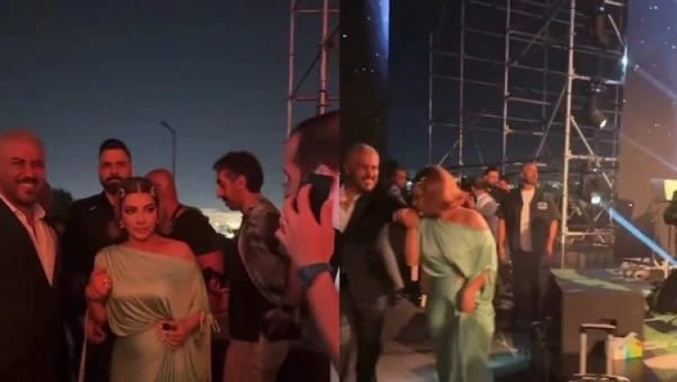 أصالة تثير الجدل بسبب تقبيل يد زوجها قبل صعودها على المسرح