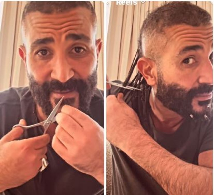 في فيديو على حسابه الشخصي..  أحمد سعد يقص ضفائر شعره ويزيل أقراط ذقنه